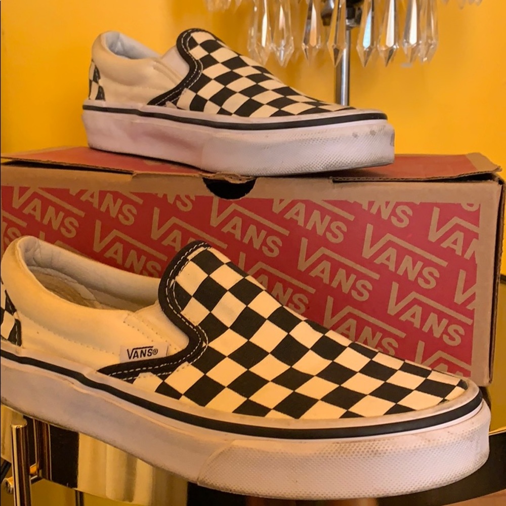 Black & White checkerboard slip-on vans.